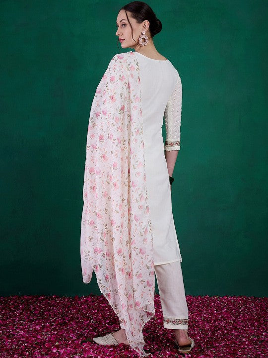 Embrace elegance with this exquisite white kurti set, featuring delicate mirror work, intricate embroidery, and a floral-printed dupatta