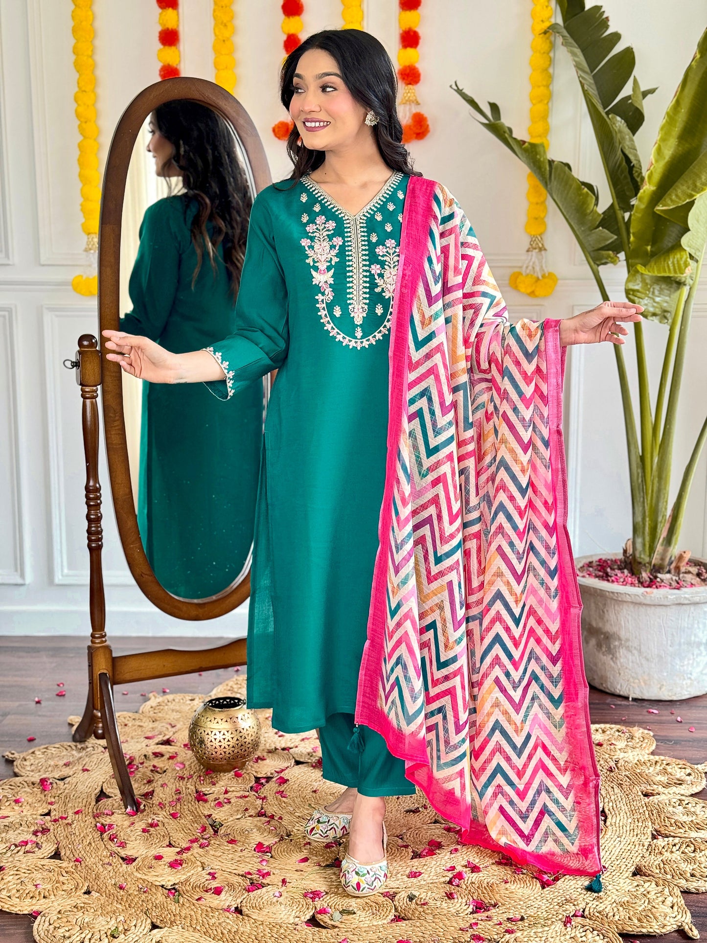 Add a pop of elegance to your wardrobe with this vibrant green kurti set. Featuring delicate floral embroidery