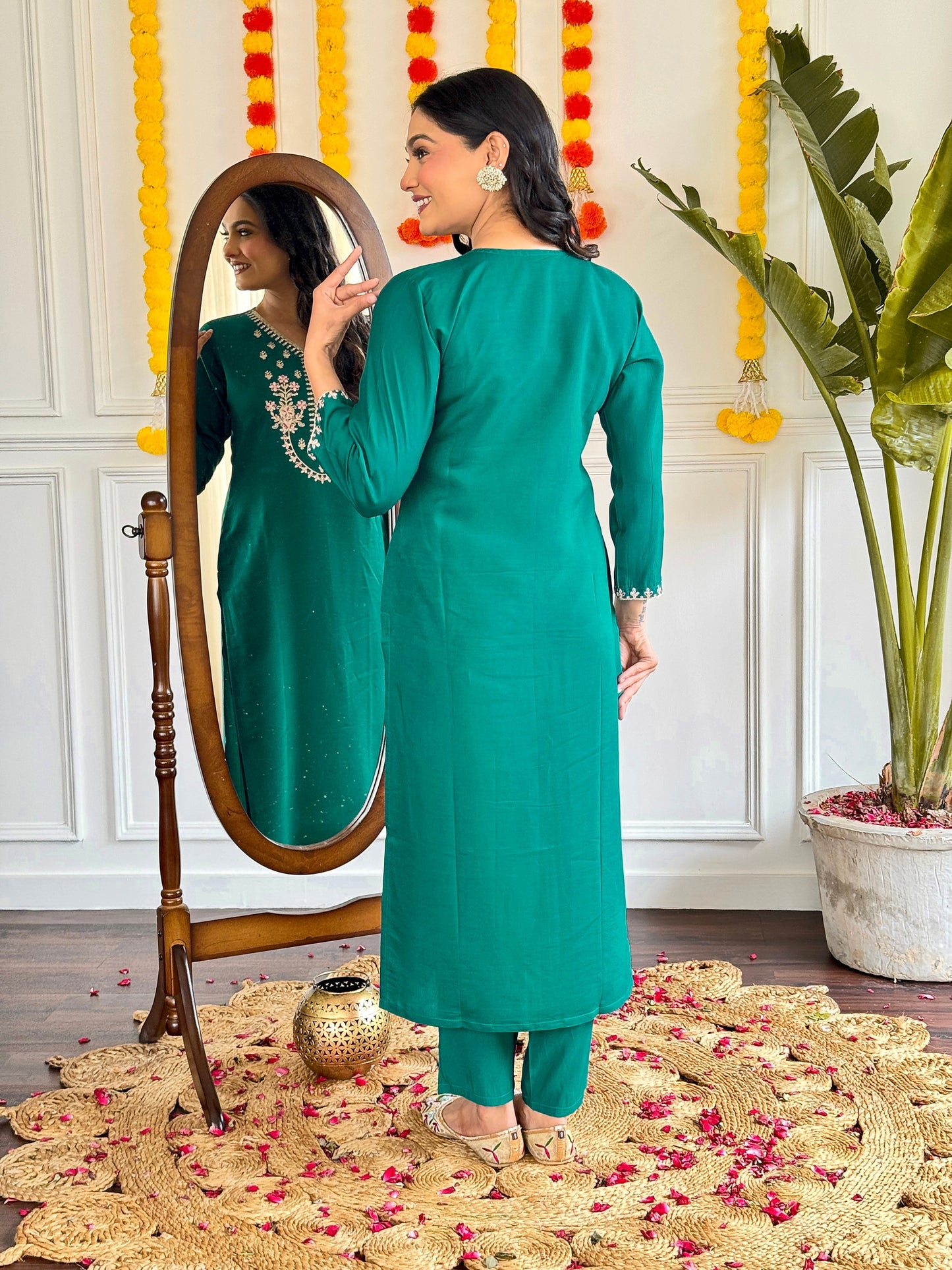 Add a pop of elegance to your wardrobe with this vibrant green kurti set. Featuring delicate floral embroidery