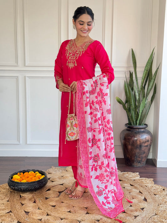 Radiate elegance in this vibrant pink kurti set, featuring exquisite gold embroidery and a beautifully printed floral dupatta