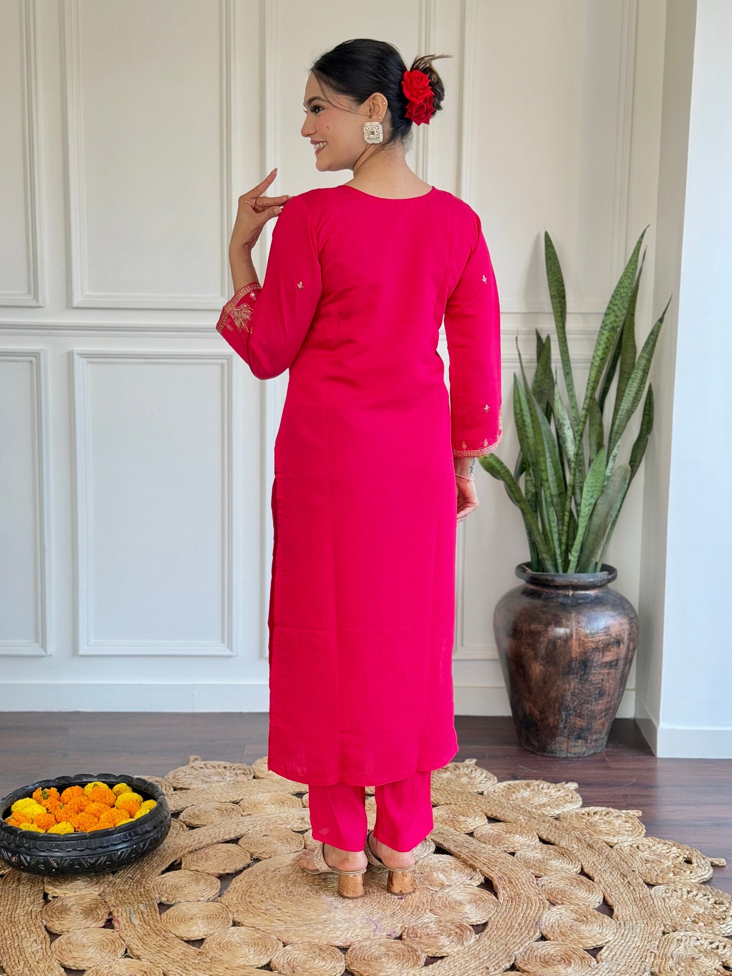 Radiate elegance in this vibrant pink kurti set, featuring exquisite gold embroidery and a beautifully printed floral dupatta