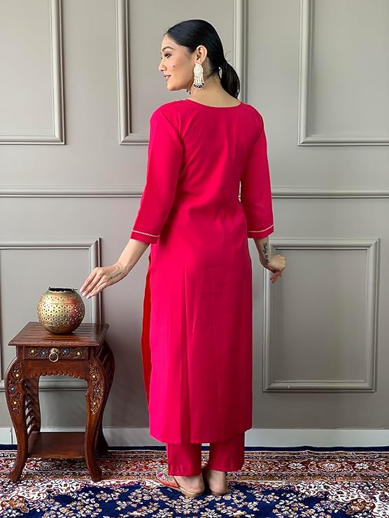 Embrace elegance with this stunning fuchsia pink kurti set, featuring delicate embroidery and a contrasting deep blue dupatta with intricate patterns