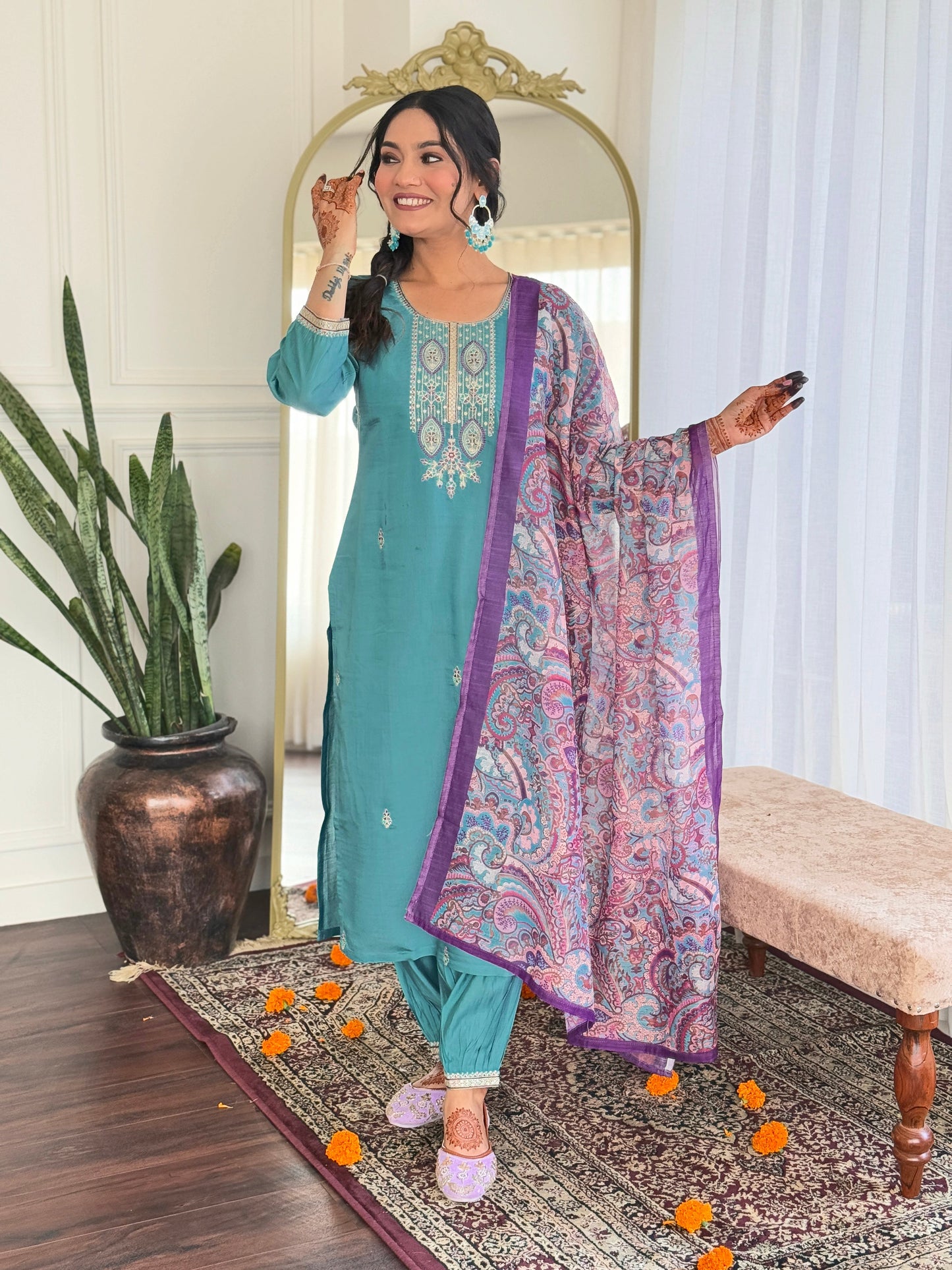 Embrace elegance with this serene teal kurti set, featuring intricate embroidery and a beautifully printed dupatta