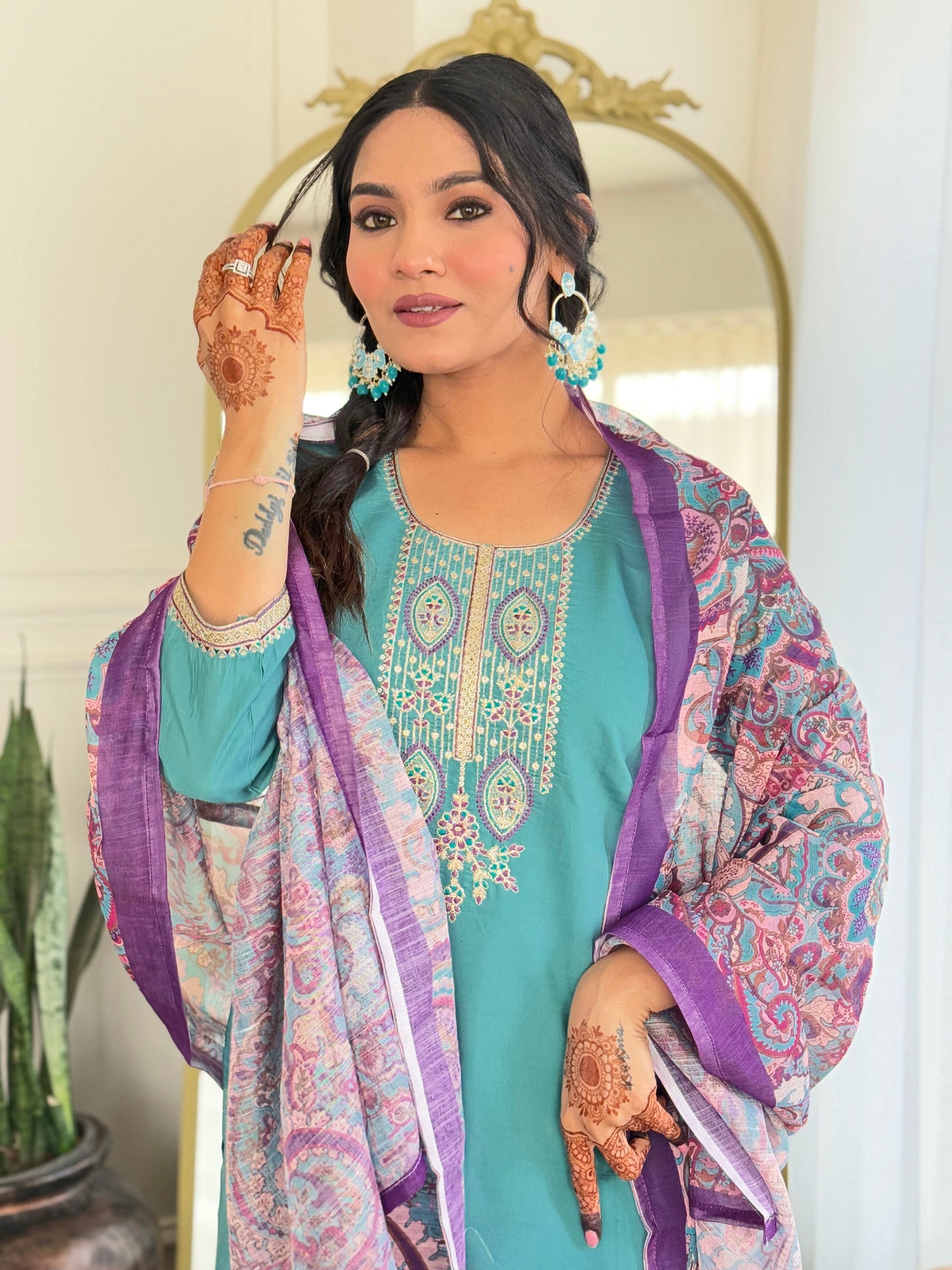 Embrace elegance with this serene teal kurti set, featuring intricate embroidery and a beautifully printed dupatta