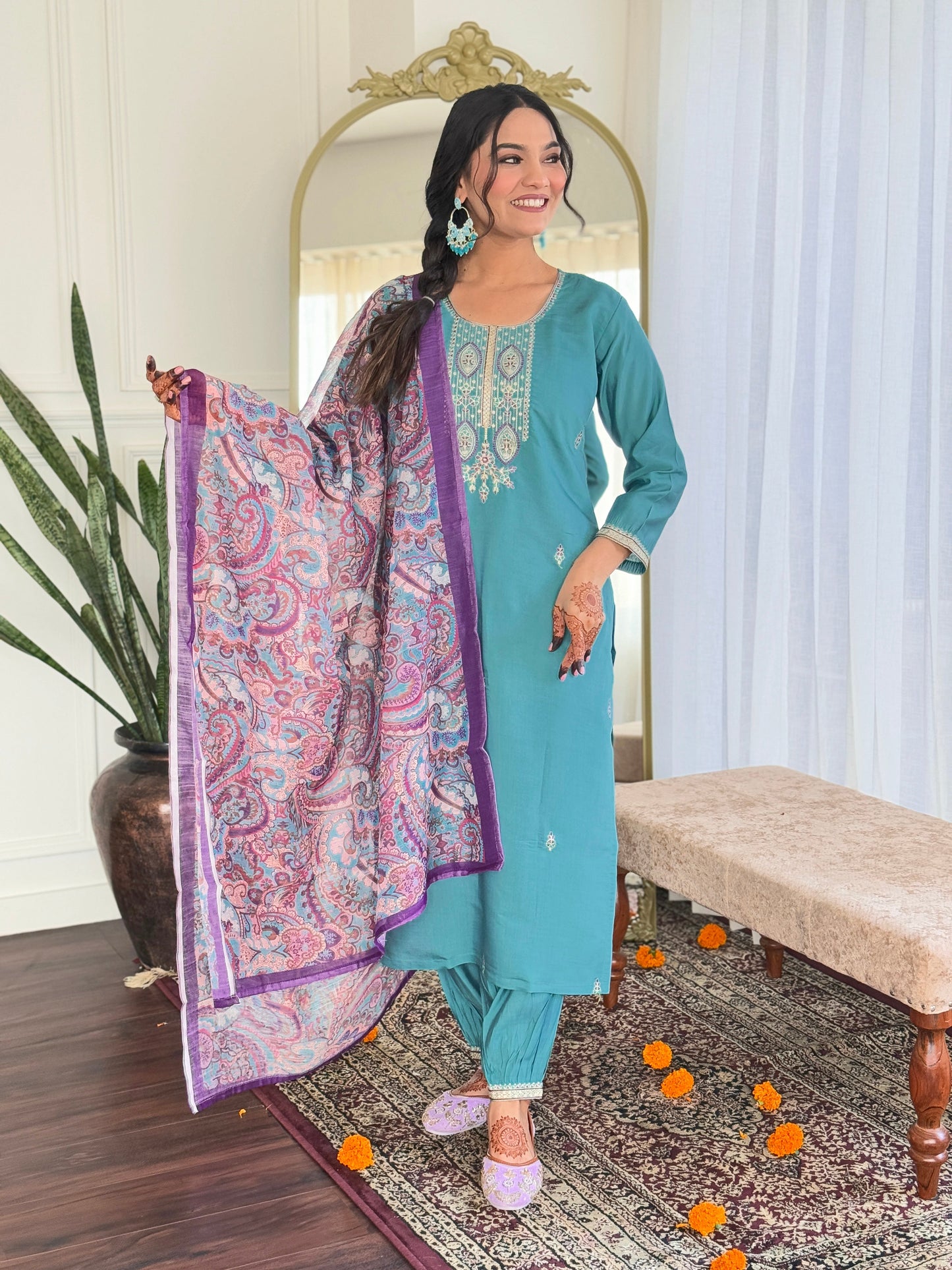 Embrace elegance with this serene teal kurti set, featuring intricate embroidery and a beautifully printed dupatta