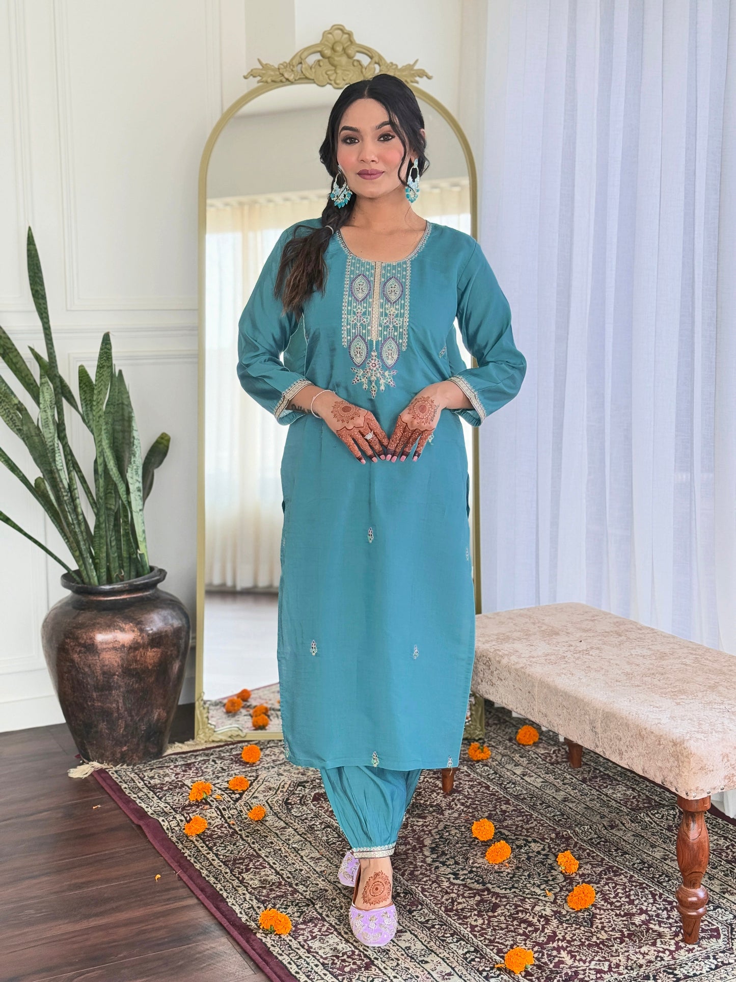 Embrace elegance with this serene teal kurti set, featuring intricate embroidery and a beautifully printed dupatta