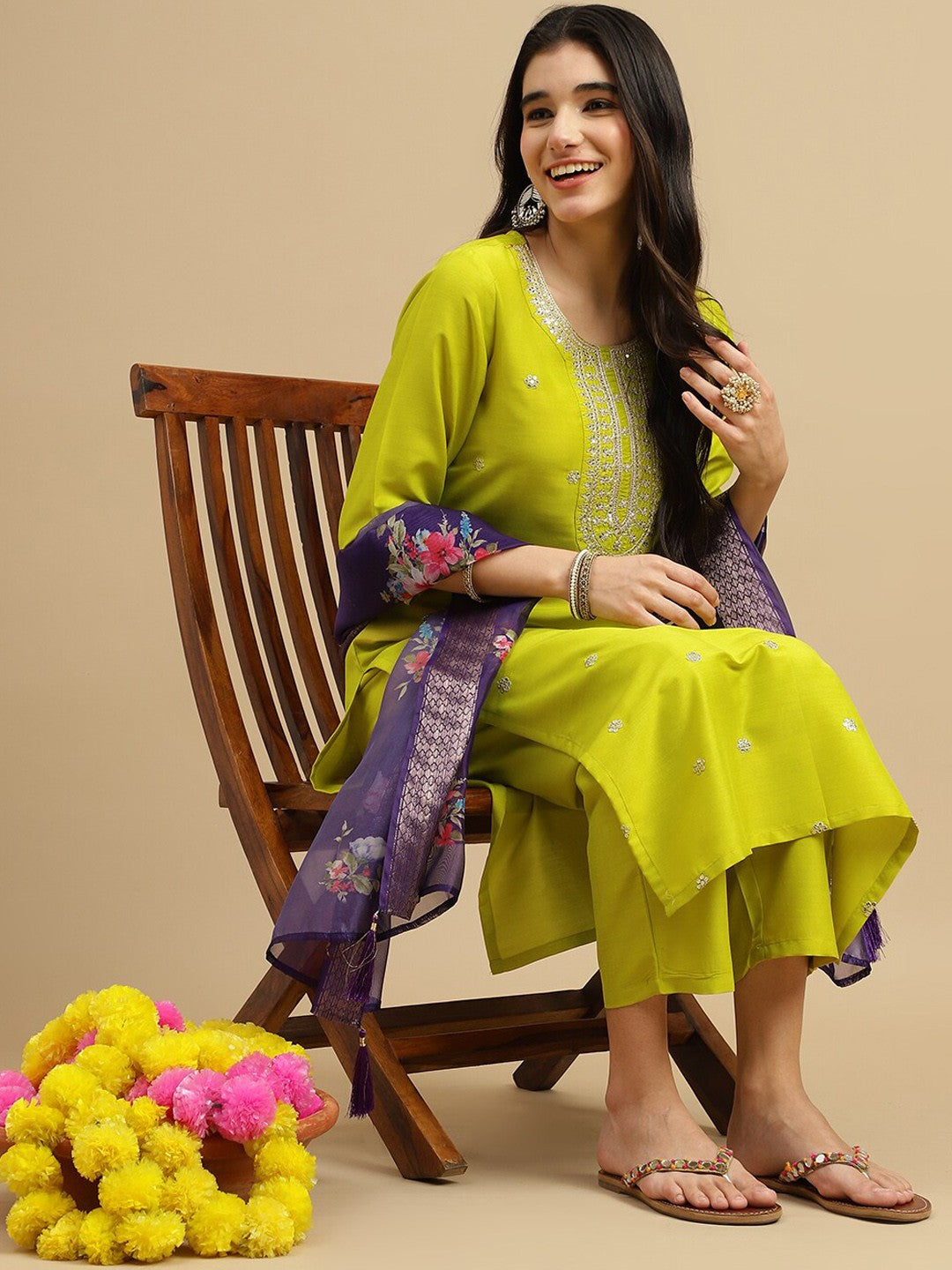 Brighten up your wardrobe with this stunning lime-green kurti set! Featuring delicate embellishments and a contrasting floral dupatta