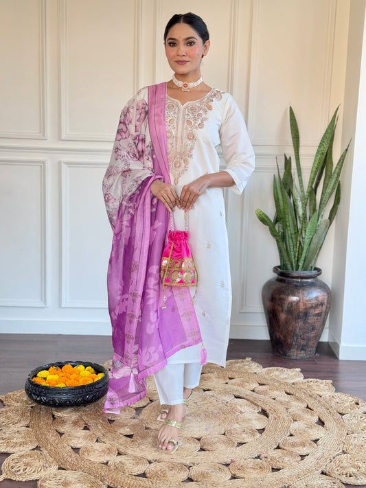 Embrace elegance with this serene white kurti set, adorned with delicate pastel embroidery and a floral-printed blue dupatta