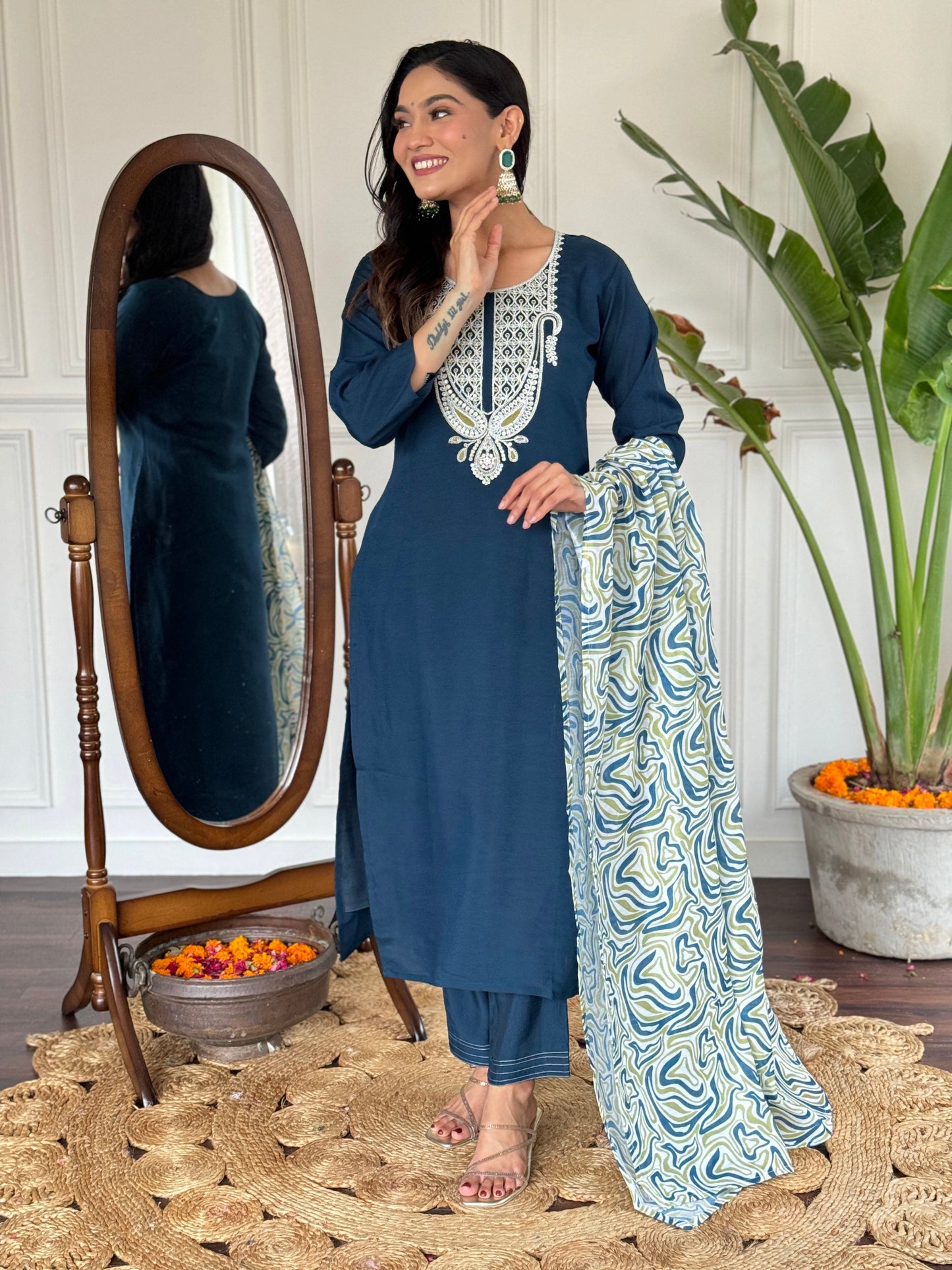 Elevate your style with this sophisticated navy blue kurti set, featuring intricate white embroidery on the neckline