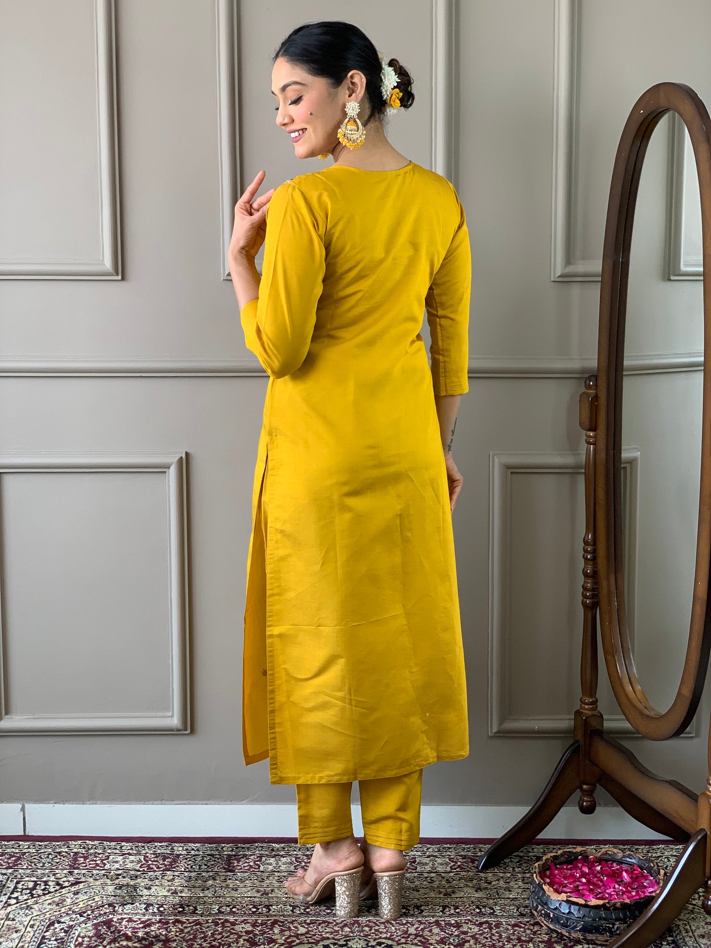 Elevate your style with this stunning mustard yellow kurti set, adorned with intricate embroidery and floral accents