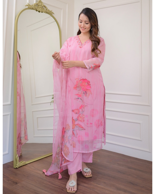 Embrace elegance with this gorgeous pink kurti set, featuring delicate embroidery and floral prints.