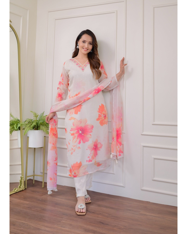 Embrace elegance with this gorgeous pink kurti set, featuring delicate embroidery and floral prints.