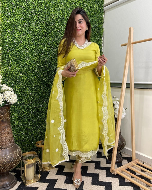 Step into timeless elegance with this vibrant green kurti set, featuring intricate mirror work and a stunning bandhani dupatta