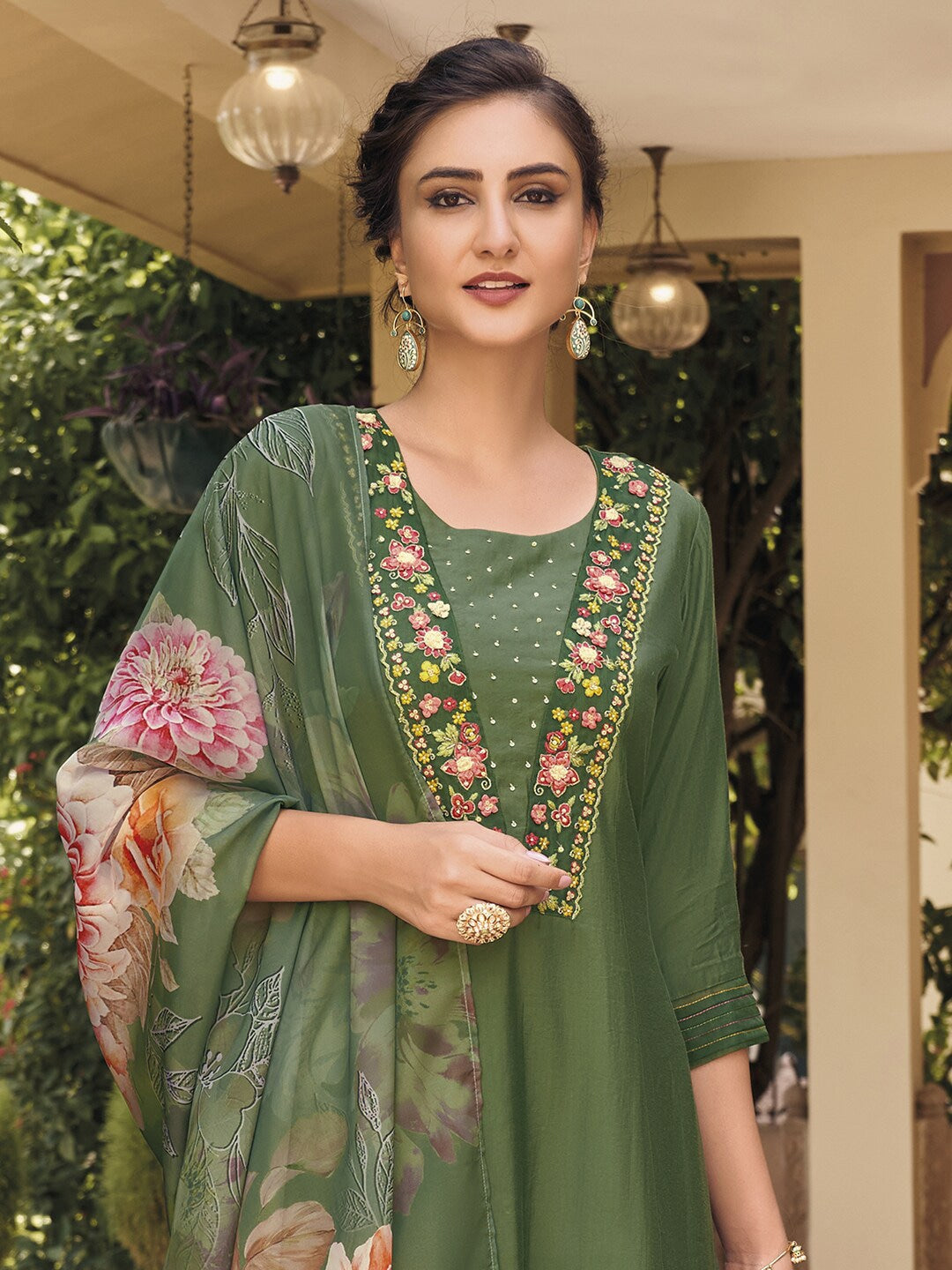 Embrace elegance with this enchanting green kurti set, adorned with delicate floral embroidery and a flowy printed dupatta. The intricate details add a touch of sophistication, making it perfect for festive and casual wear