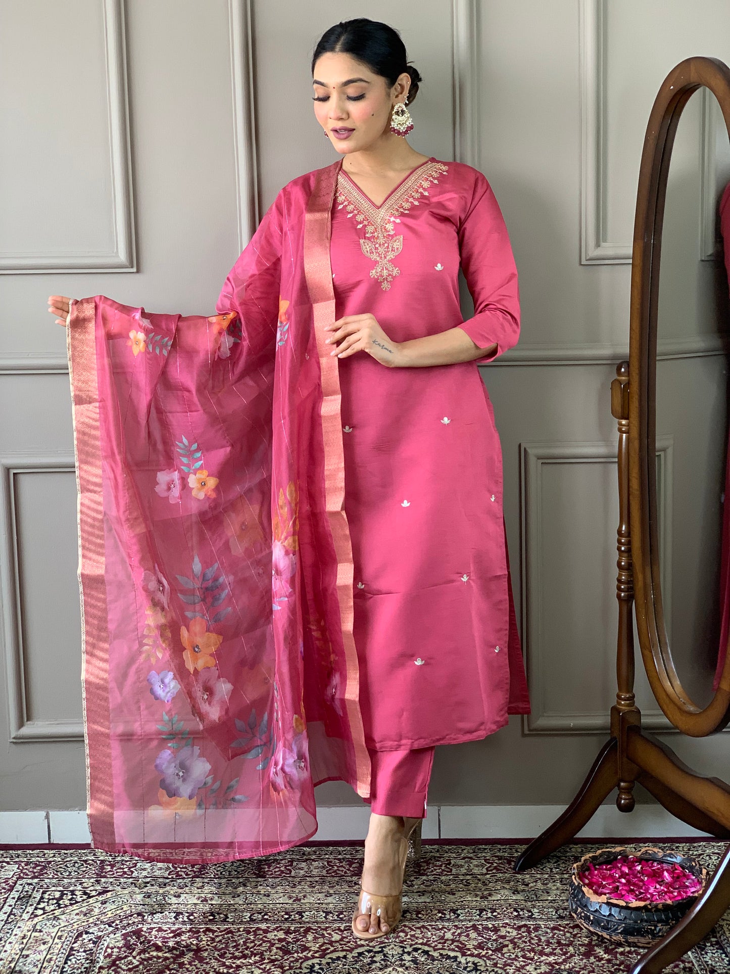 Elevate your style with this graceful pink kurti set, featuring delicate embroidery and a stunning floral dupatta. The soft fabric and elegant design make it perfect for festive gatherings or casual elegance