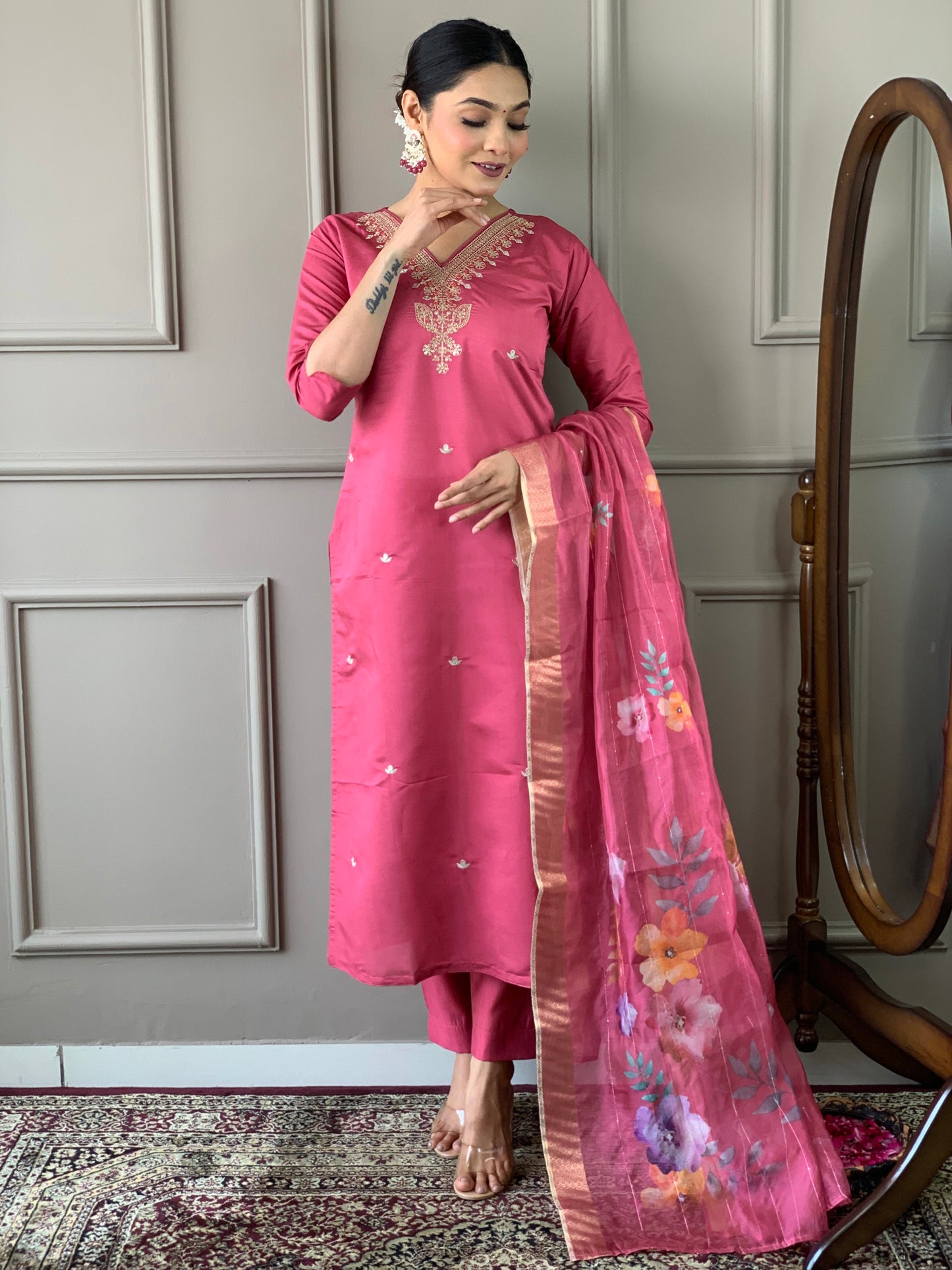 Elevate your style with this graceful pink kurti set, featuring delicate embroidery and a stunning floral dupatta. The soft fabric and elegant design make it perfect for festive gatherings or casual elegance