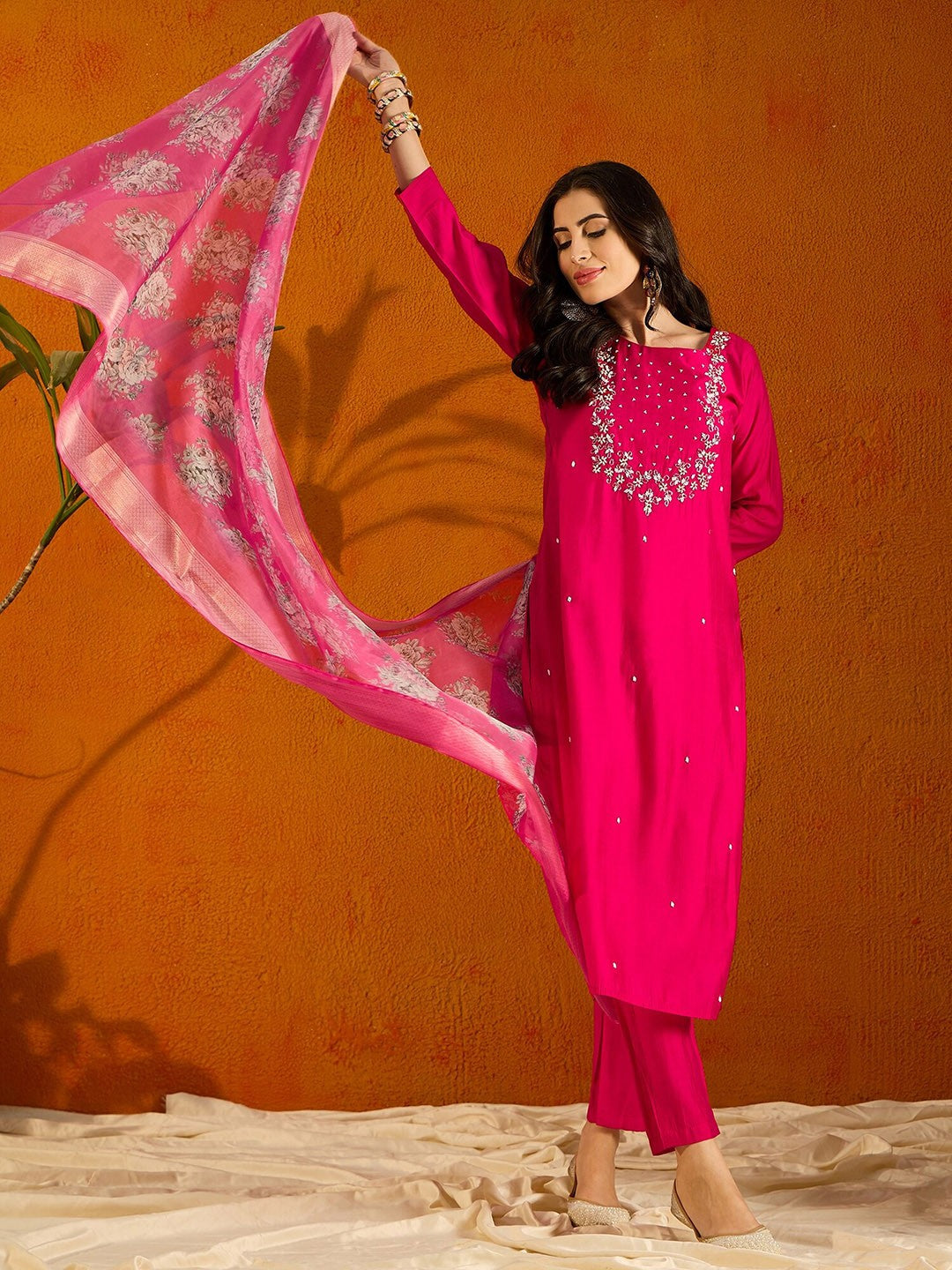 Step into elegance with this teal blue kurti set, adorned with intricate embroidery and a beautifully printed dupatta. The rich color and delicate detailing make it a perfect choice for festive occasions and gatherings.