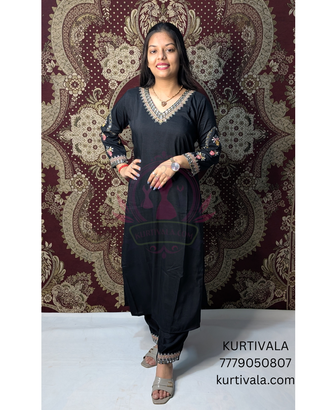 Elegant black kurti set adorned with intricate embroidery and a stylish printed dupatta. Perfect for festive occasions and casual gatherings, offering a blend of traditional charm and modern sophistication